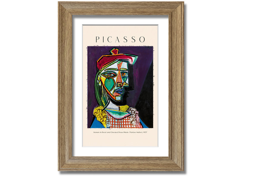 A vibrant reproduction of Picasso's 'Woman In Beret And Checked Dress 1937' printed on canvas, framed and ready to hang.